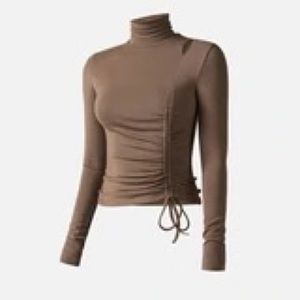 OGL move NWT ribbed turtleneck with cutout and rouched tie